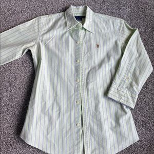 Women’s polo button down shirt.